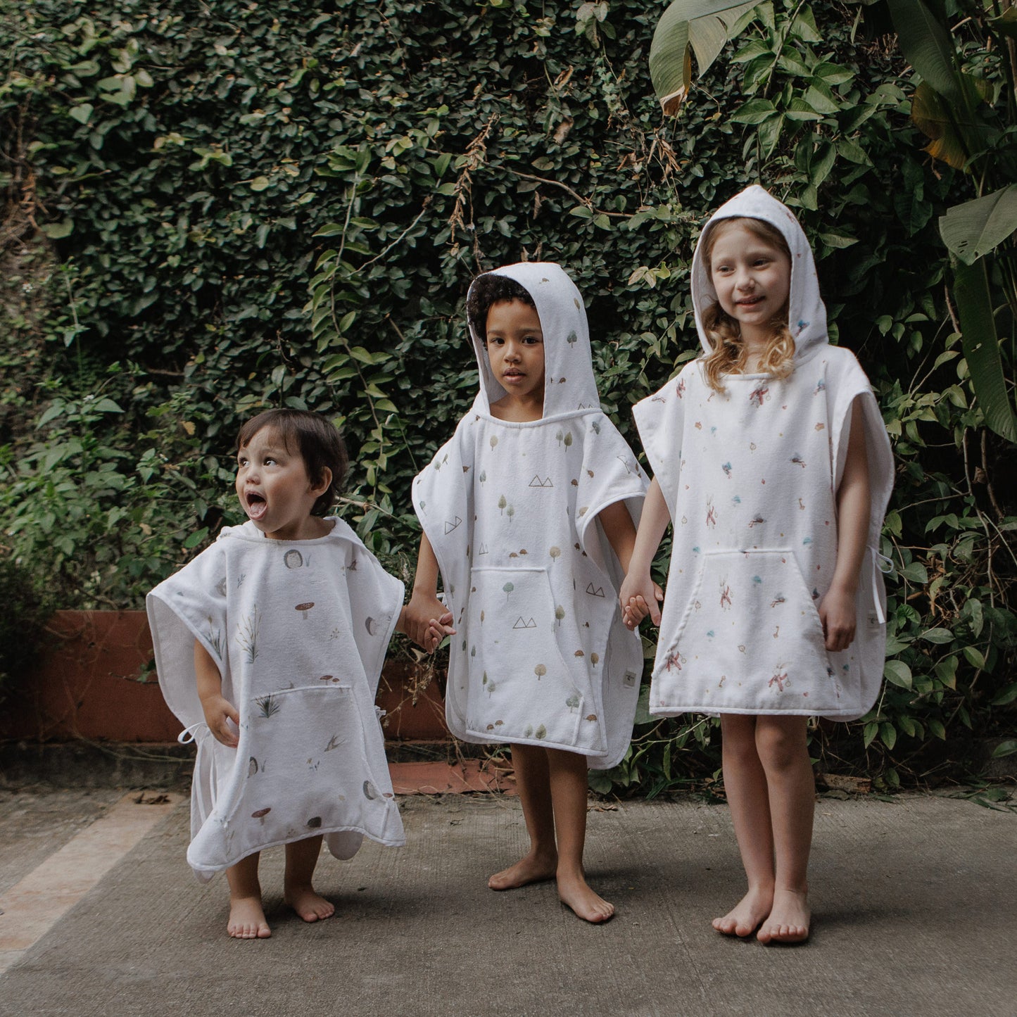PONCHO EM FELPA ESTAMPADA JABUTI